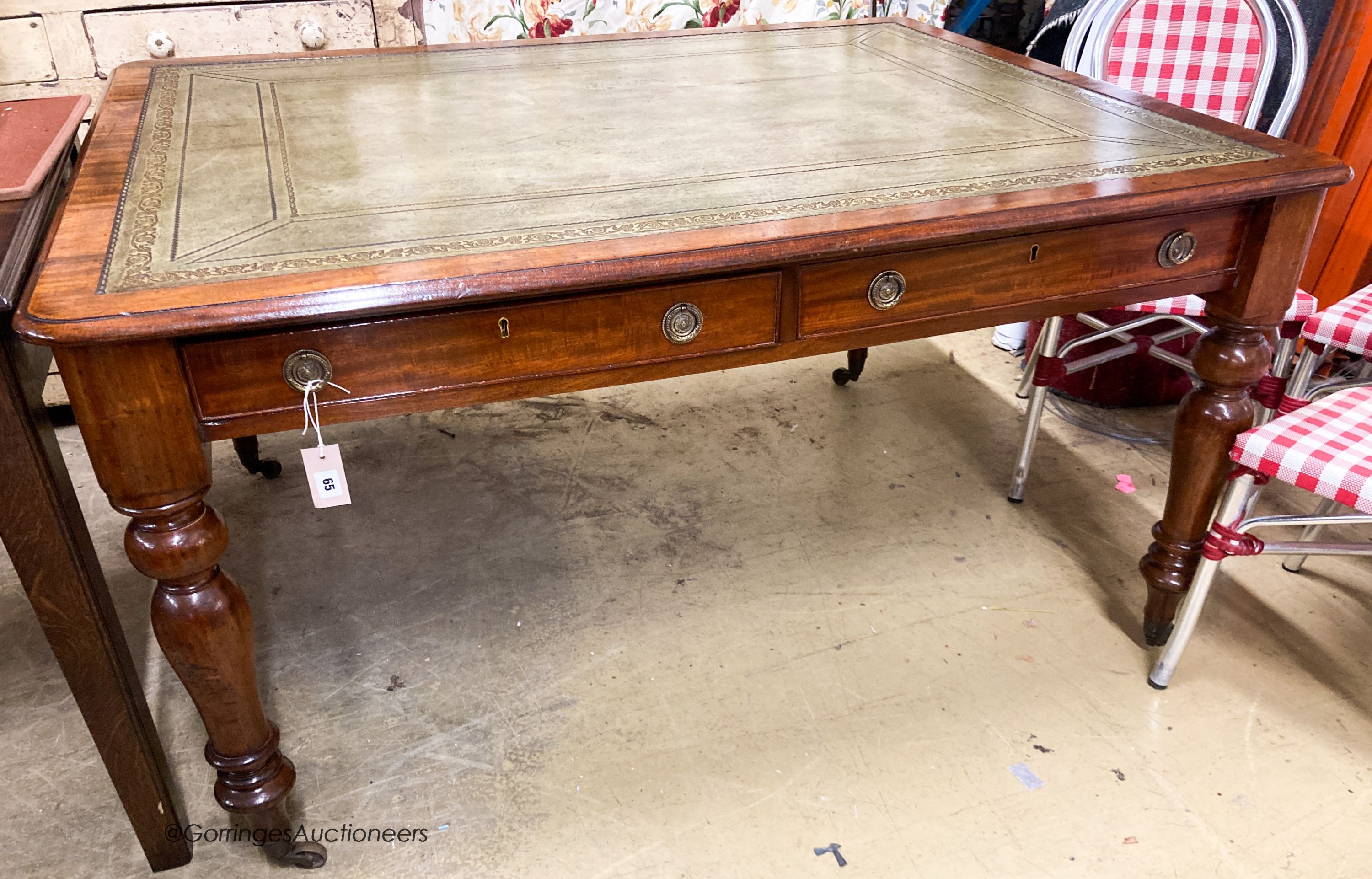 A Victorian mahogany partner's writing table, with green leather inset skiver, W.145cm D.112cm H.76cm